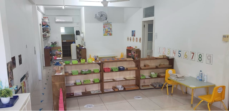 Wide view of a prepared Montessori classroom at The Children's Montessori House